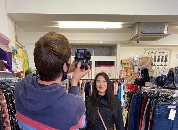 The thrifty island girl Lei Hang aka Price Cut Princess behind the scenes filming Bargain Brits on Benefits for Channel 5 in the charity shop Dress for less  in newport isle of wight