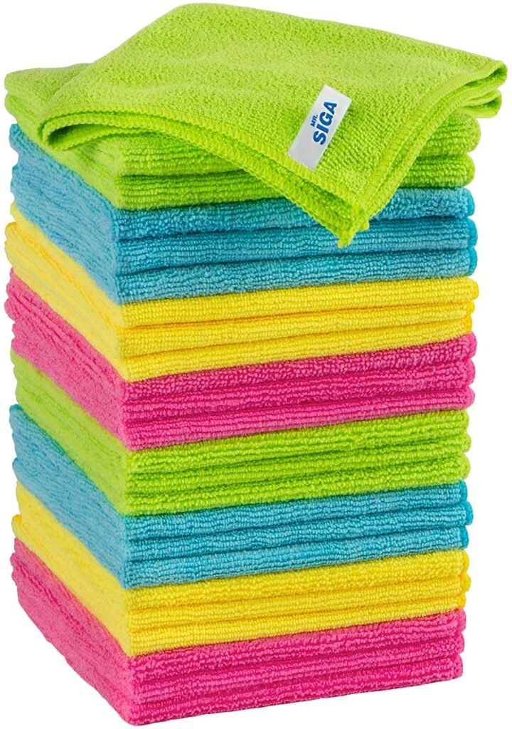 Stack of 24 yellow blue pink green microfibre cleaning clothes, a must have multi purpose cleaning product that is also eco- friendly