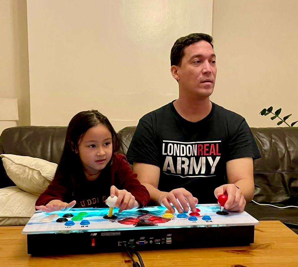 Yasmin playing arcade games with stepdad Oliver Reade 